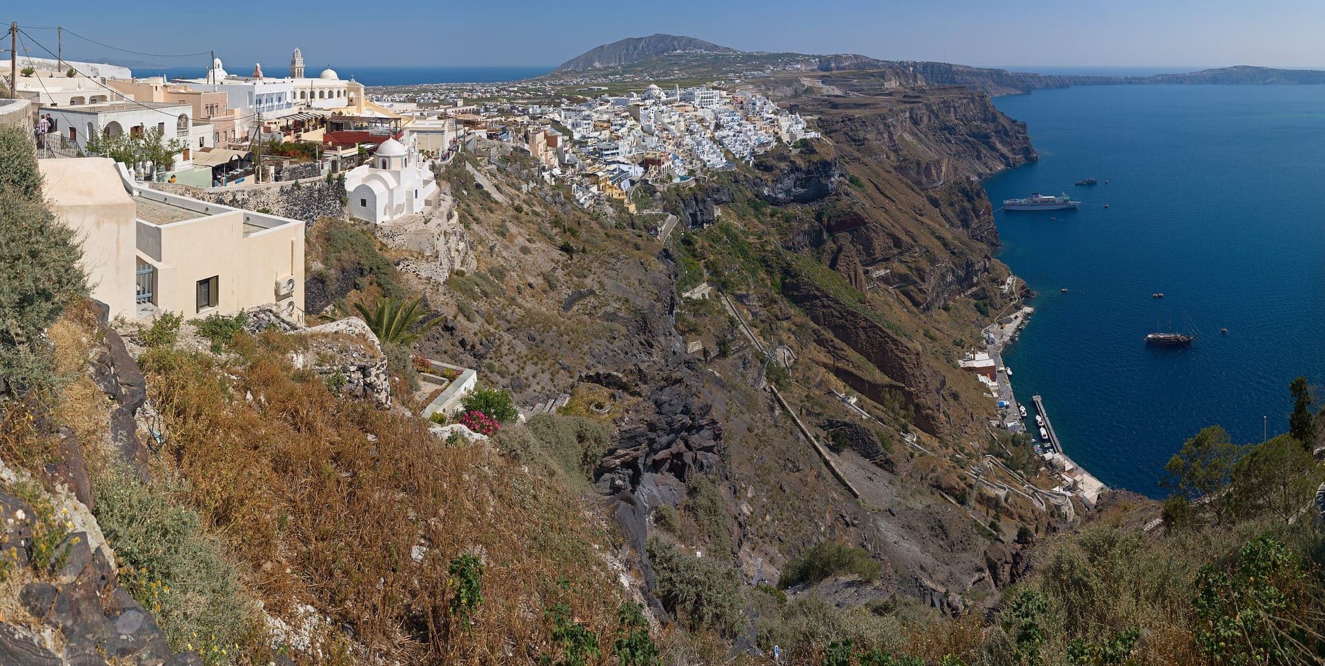 Santorini cruise tender and Fira caldera port scene